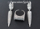A set of sterling silver 925 jewelry including a dome ring and a pair of long earrings with traditional Armenian patterns.
