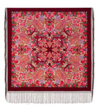 This merino wool scarf features a colorful floral pattern with fringes. The burgundy red base is decorated with vintage-style red and pink roses in Slavic tradition.
