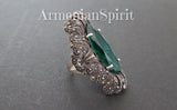 Precious metal silver 925 with marcasite oversized ring in a shape of peacock tail and large emerald green gemstone.