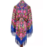 Colorful floral patterned blue shawl with silky fringes. The ornament is vintage large pink peony flowers. The material is merino wool.