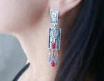 Elevate your style with our high quality 925 silver jewelry from Armenia. With very long dangle earrings featuring vibrant red oval garnets and a boho style, you'll make a statement wherever you go. Plus, our jewelry is irritation-free for comfortable wear. Shop now and step up your fashion game. Discover the beauty and quality of Armenian 925 silver jewelry with our very long dangle earrings featuring red oval garnet. Embrace the boho style and enjoy comfort without any irritations. Perfect for holiday gi
