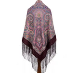 Paisley patterned merino wool purple shawl with fringe on a white background. Cozy travel blanket scarf cashmere fringed.