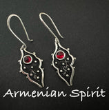 A pair of Armenian earrings with black hook design and red garnet stones on a dark background, with the text 'Armenian Spirit' displayed.
The best Armenian silver store offers handcrafted designs inspired by tradition. Each item is made with care and sent directly from Armenia. The shop is reliable, ensuring safe international shipping. Ideal for those searching for where to buy silver jewelry after closing Armenian stores on Etsy. Armenian Spirit is now the top online silver seller for ethnic pieces.


