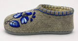 Natural wool indoor botties with blue embroidered flower and rubber outsole.