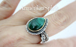 Upgrade your style with our Best jewelry store's stunning green malachite silver and gold ring. The unique teardrop gem is accented with delicate leaf details for a touch of elegance. Make a statement and add a pop of color to any outfit. Perfect for any occasion. Buy on etsy or ebay from our best jewelry stores.