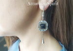 Buy long and modern earrings till shoulders on chains and with dark gemstone. These earrings are conteprorary artwork of Armenian jewellery makers. Buy jewelry online from Armenia with free shipping worldwide from Armenian Spirit jewellery store.