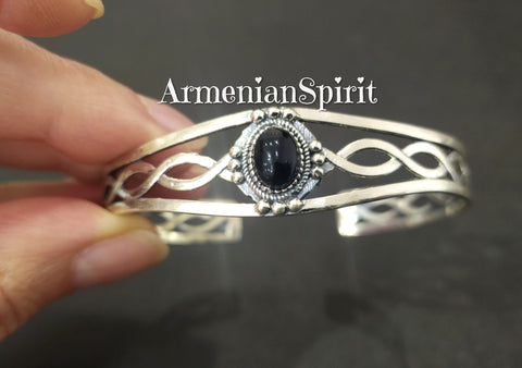 Discover the timeless beauty of our Bracelet sterling silver 925 onyx Armenian Spirit. Handcrafted with ethnic traditional design, this bracelet is a true symbol of Armenian heritage. Made with high-quality materials, it's the perfect addition to your jewelry collection. Enjoy free shipping on all orders through our etsy, ebay, and shopify shops.