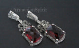 These stunning earrings are crafted with the highest quality 925 silver and adorned with exquisite red topaz gemstones. Perfectly complement any outfit, especially those with a touch of Armenian spirit. Their large size makes them ideal for pairing with velour cosplay dresses, creating a truly eye-catching look. Elevate your style with these statement earrings.