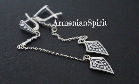 Upgrade your jewelry game with our high-quality, handcrafted sterling silver 925 earrings from Armenian artisans. The very long chain design features an English lock for secure wear, perfect for an everyday boho and ethnic look. Hypoallergenic and irritation-free, these earrings are ideal for all-day wear. Buy online chain earrings reaching the shoulder.
