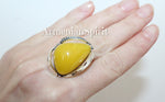Unique one of a kind jewelry with Baltic amber yellow gemstone. Buy gifts for beloved woman with amber gemstones.