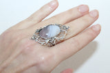 Armenian artisan jewelry, unique ring with filigree ornament handcrafted jewelry for woman. The ring is adjustable. The stone is oval cabochon amethyst.