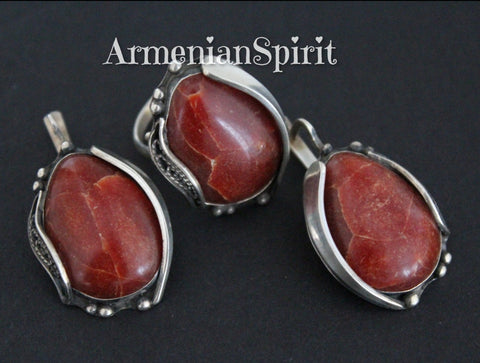 Buy handcrafted jewelry set which consist of oval earrings and ring  with unique design and one of a kind with coral gemstones. The jewelry set is made with unique design which is idea of Armenian artisan and jewelry maker. The pattern has details of Armenian taraz tradtional costume. ornament is very rare and Armenian jewelry makers can make a really neat work.