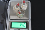 buy silver jewellery lightweight with gilded details and red coral gem