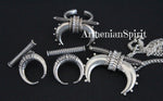 Buy armenian handmade silver jewelry horns  like vicking large pendant, stud earrings and ring. The horn earrings are small are feels comfortable on the earlobe. The pendant is larger that ring and earrings and has attached chain. The ring is a horn too look like celtic or vicking style jewelry.