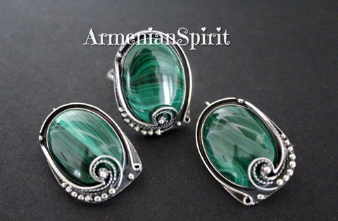 Elevate your style with our unique Armenian Spirit earrings and adjustable ring, hand-crafted with sterling silver 925 and a smooth, natural malachite stone. With a vintage-inspired design, these oval hooked pieces are sure to add lightness and charm to any look. Buy with confidence and add a treasure to your collection. Purchase online from our store on Etsy and Ebay. Enjoy discounts and free shipping with tracking. Elevate your style with our premium selection.