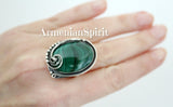 This handmade oval ring for women is made from high quality sterling silver with a 925 stamp. It features a polished malachite stone with natural stripes for a unique and beautiful look. Perfect for adding charm and lightness to any outfit. Give the gift of Armenian craftsmanship with this retro style ring, ideal for a birthday gift for mom.  Elevate your look with the best on Etsy and eBay - shop now!