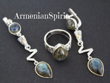 Indulge in the dream of high-quality, stylish jewelry with our Armenian Spirit collection. This stunning set is made from sterling silver and features a natural labrador gemstone in bright blue. Perfect as a gift for any woman, especially those with a labrador birthstone. Buy online from our trusted platforms like Etsy and eBay. Elevate your style and shop confidently with us.