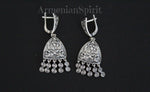 Add a touch of elegance and cultural heritage to your collection with our high quality jewelry. Handcrafted in Armenia, our sterling silver 925 earrings feature traditional taraz design with intricate detailing and dangling eternity signs. The triangle shaped ring reflects the beautiful Armenian Van and Vaspurakan style, making it perfect for everyday bohemian wear. Lightweight and stylish, these jewels are a must-have for any jewelry lover. Buy Arminian jewelry online traditional taraz earrings.