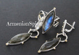 Discover the beauty of Armenian craftsmanship with our high quality sterling silver 925 jewelry set. Adorned with stunning Labradorite blue gems, this set includes a pair of earrings and a ring, both plated in elegant gold. Elevate your style with this unique and timeless piece.  Shop confidently with our top-rated store, offering discounts and free shipping with tracking. Purchase online from our platforms on Etsy and eBay for the best selection and quality.