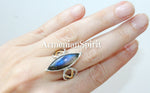 This high quality sterling silver 925 ring from Armenian Spirit's Etsy shop features a long design and a jewelry set with gold plating. Adorned with a beautiful Labradorite blue gem, this ring serves as both a stylish accessory and a zodiac birthstone, providing both aesthetic value and personal significance. We pride ourselves on offering the best on Etsy and eBay, and sell on multiple platforms for your convenience.