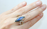 This high quality sterling silver 925 ring from Armenian Spirit's Etsy shop features a long design and a jewelry set with gold plating. Adorned with a beautiful Labradorite blue gem, this ring serves as both a stylish accessory and a zodiac birthstone, providing both aesthetic value and personal significance. We pride ourselves on offering the best on Etsy and eBay, and sell on multiple platforms for your convenience.