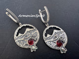 Silver earrings with red stones and Armenian Ararat mountain on a dark background, branded 'Armenian Spirit'.