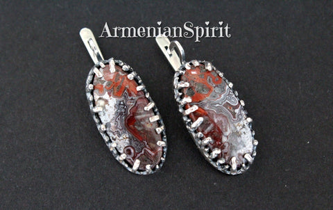 These earrings are made of silver and Mexican lace agate also known as crazy lace agate. The gemstone has very unique pattern which resmbles lace ornament. These earrings are one of a kind and made by Armenian famous jewelrs uzsing unique design and ideas. Armenian spirit jewelry is high quality silver jewelery for women, men and children.