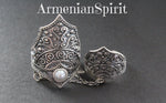 Experience the exquisite craftsmanship of Armenia with our Double Ring Sterling Silver 925. Made with traditional techniques, this full finger cover ring showcases the beauty of Armenian Spirit. The 925 sterling silver and lab pearl materials guarantee a stunning and durable piece of jewelry.