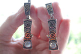 Buy labradorite gemstone earrings with gilded details, sun mythology symbol and eternity.