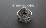 Armenian tradtional symbols in silver jewelry are arevakhach eternity sign and flowers which has ethnic tribal style. This ring is made of sterling silver 925 and four small black onyx gemstones. The ring is adjustable but for sizes US 8, US 8.5, US 9 and US 9.5. for thick fingers. The jewelry is made by Armenian artisans and have unique design.