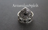 Armenian tradtional symbols in silver jewelry are arevakhach eternity sign and flowers which has ethnic tribal style. This ring is made of sterling silver 925 and four small black onyx gemstones. The ring is adjustable but for sizes US 8, US 8.5, US 9 and US 9.5. for thick fingers. The jewelry is made by Armenian artisans and have unique design.