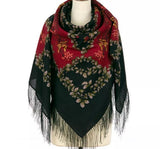 Wrapping shawl displayed on a mannequin in black and red colors.