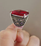 Experience the luxury of 19th century inspired design with our handmade Armenian jewelry. Crafted from high quality sterling silver, this large ring features marcasites and a stunning red transparent stone in a vintage style. The perfect gift for a 60 years old woman.
