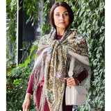 A woman wearing this mint and purple shawl looks fresh and elegant. The colors are soft yet eye-catching, and the long silky fringe adds a fashionable touch. Large enough to wrap comfortably and very stylish.