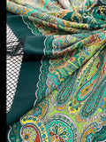 Colorful paisley-patterned shawl with a green border and silky fringe. The scarf`s colors are dark and light green, salad hues and yellow pattern.