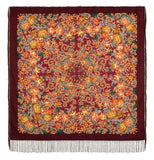 Floral patterned merino wool scarf with fringes on a white background