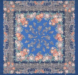 Wrapping warm scarf with vintage peony flowers in delicate peach and paisley patterns on a blue background.