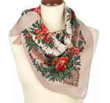 Floral vintage patterned merino wool Slavic neck scarf on a mannequin with a white background
