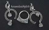 Add a touch of elegance to your style with our high quality handmade Armenian filigree jewelry. These chandelier earrings feature intricate lilly of the valley details and the lightweight ring boasts an unusual and eye-catching design. Made with sterling silver 925, our jewelry is both beautiful and durable. Elevate your accessories game today!
