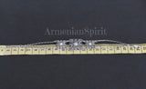 Silver bracelet near the yellow ruler. With white pearls, flowers and square details. Where to buy silver jewelry after closing Armenian stores on Etsy?
Armenian Spirit store is your answer.
They’re the top online silver seller and very reliable. The best Armenian silver store is now just a click away. All jewelry comes directly from Armenia with traditional charm.