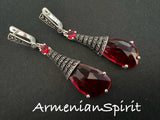 Enhance your look with Armenian Spirit luxury earrings, crafted in high-quality sterling silver 925. Featuring an elegant design with a transparent red stone and marcasite, these extra long earrings shine at parties and add a touch of class to any outfit. Purchase online at our jewelry store.
