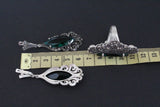 Earrings and ring 6 cm in a peacock tail shape with marcasite and English lock. 