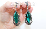 Armenian handmade long dangle earrings made from sterling silver featuring emerald  green topaz stones and marcasite.
