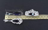 Earrings and ring marcasite silver near a ruler showing 66 cm length with Armenian Spirit brand title.
