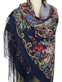 Navy blue vintage peony floral patterned woolen scarf for woman with silky fringe on a mannequin against a white background
