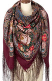 An oversized, extra-large shawl in deep wine red, adorned with vintage peony flowers in soft pink and beige. Crafted from luxurious merino wool, this wrapping scarf offers warmth, elegance, and timeless charm.