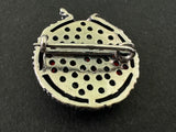 This 1 inch pin brooch is expertly crafted by hand in Armenia using high-quality sterling silver and a beautiful red transparent stone. Its pomegranate design adds a touch of elegance to any outfit or accessory. A must-have for any jewelry lover!

