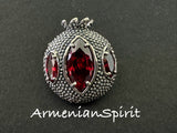 Expertly crafted by Armenian artisans, this Sterling Silver 925 Pomegranate Brooch is a true work of art. The intricate design and use of red transparent stone perfectly capture the beauty and symbolism of the pomegranate. Elevate any outfit with this stunning handmade jewelry.
