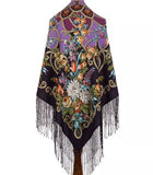 Colorful vintage floral-patterned merino wool like cashmere palatine with fringe in black and purple colors on a white background