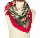 Colorful red and beige peony floral and paisley patterned woolen Slavic  scarf on a mannequin